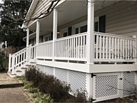 <b>Front Porch with Lattice Wrap and Storage door in Lattice</b>